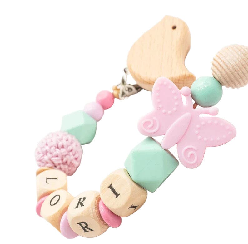 Schnullerkette mit Namen Mädchen Holzbuchstaben + Silikon Schmetterling + Häkelperle mint rosa Schnullerkette minipishop 